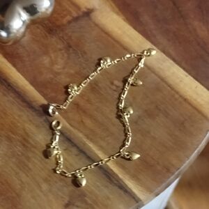 Gold Tone Hearts Charm Bracelet